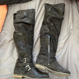 Carlos Santana black over the knee boots